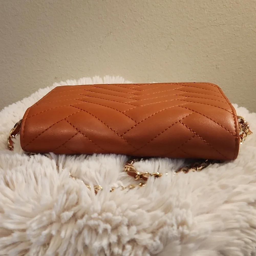 Bebe quilted bag with Gold rope chain cross body bag. Gently Used - Picture 5 of 16